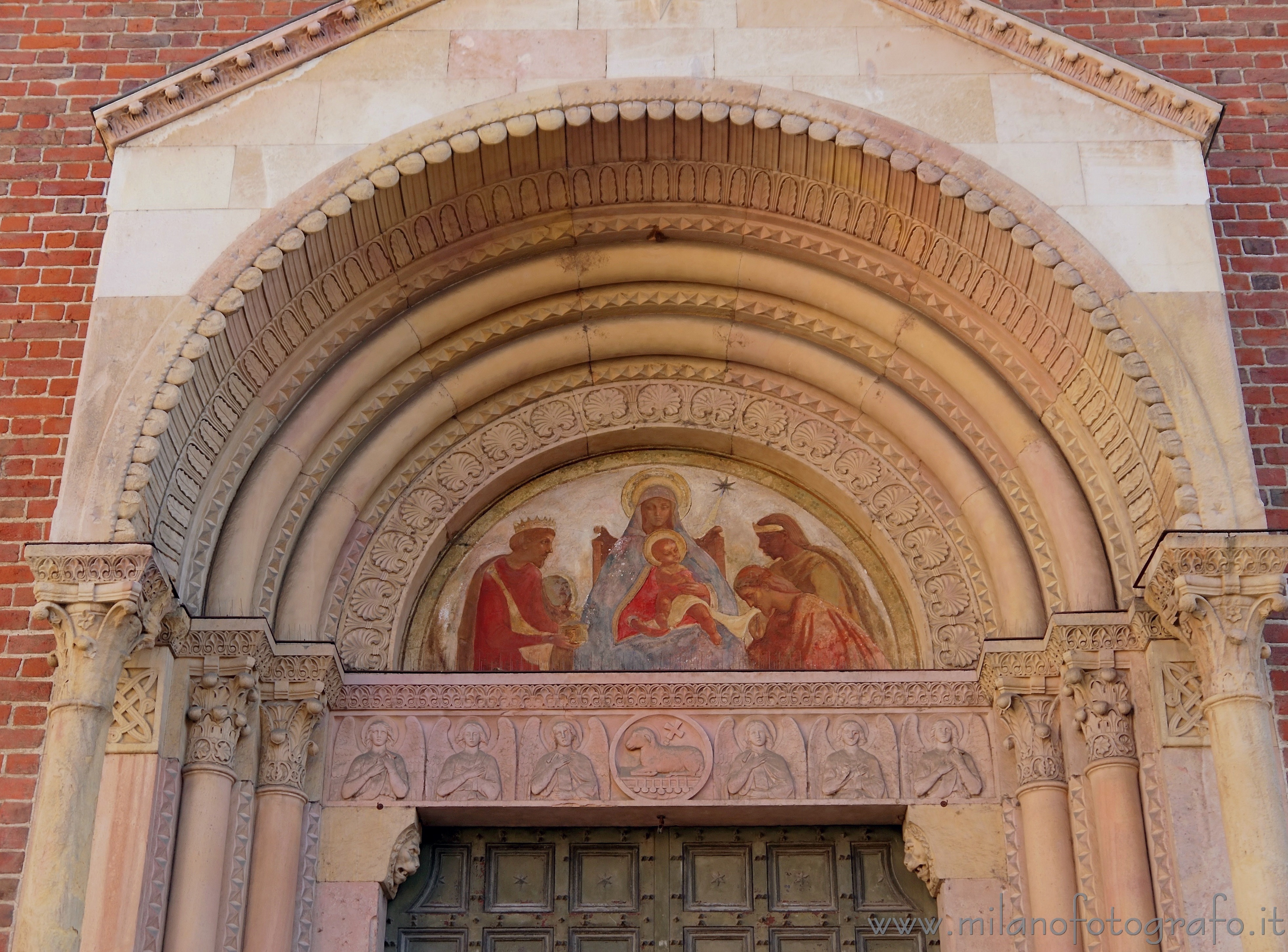 Milan (Italy): Decorations above the entrance of the Basilica of Sant Eustorgio - Milan (Italy)