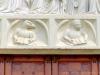 Castiglione Olona (Varese, Italy): Symbols of Saint John and Saint Mark on the architrave of the portal of the Collegiate Church of Saints Stephen and Lawrence
