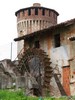 Soncino (Cremona, Italy): Ancient mill and one of the towers of the Fortess of Soncino